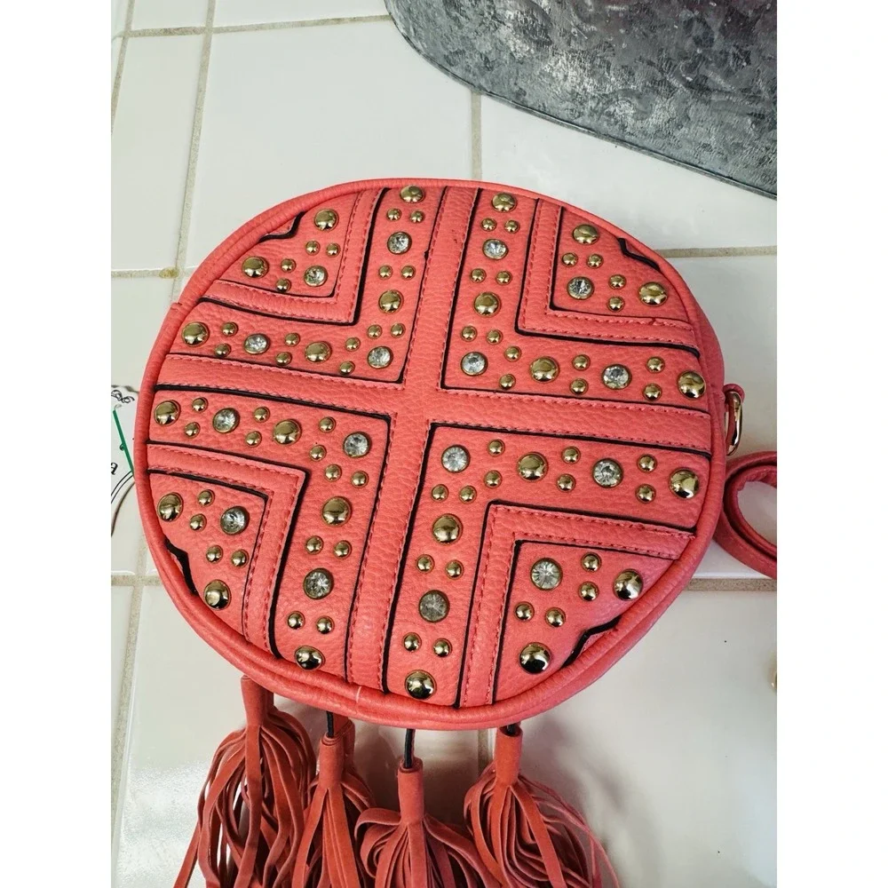 Alyssa Vegan Orange Small RoundPurse Bag with Tassels & Grommets Crossbody Strap - Picture 2 of 5